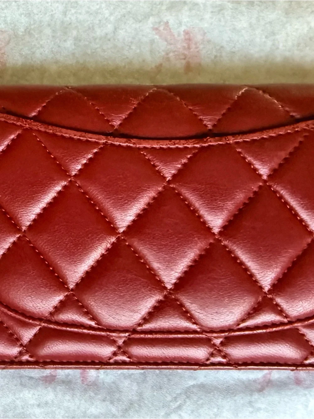 Authentic CHANEL Quilted Red Lambskin Leather Long Wallet with Silver CC Emblem.